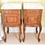 A pair of oak French style bedside cabinets with square marble tops over single drawer and single