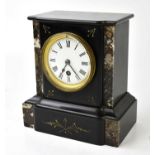 A Victorian black slate eight day mantel clock, the enamelled dial with Roman numerals, and movement