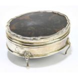 A George V hallmarked silver and tortoiseshell oval trinket box, Birmingham 1919, length 8.5cm.