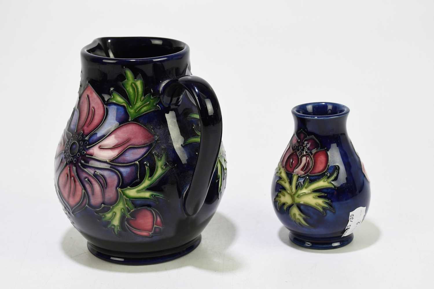 MOORCROFT; two pieces decorated in the 'Anemone' pattern, comprising a jug, height 15cm, and a squat - Image 3 of 6