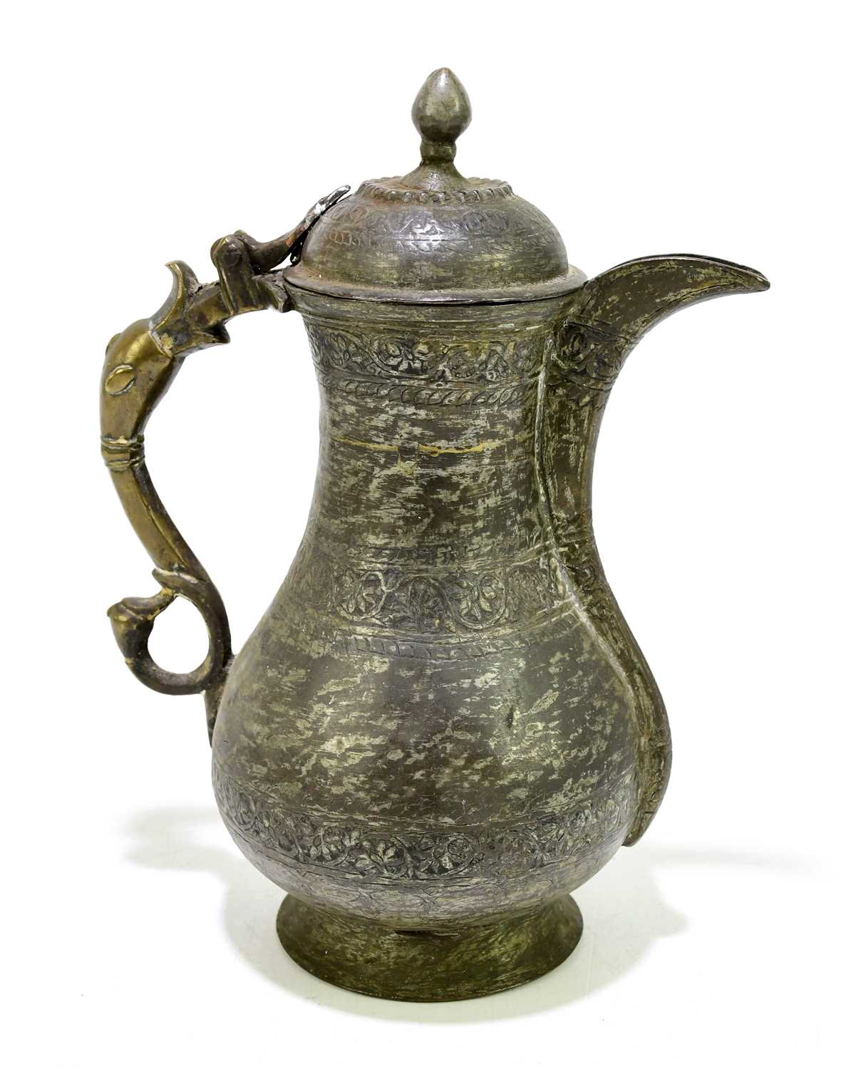 A 19th century Persian metal ewer, with foliate detailing and serpent handle, height 23cm.