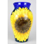 SALLY TUFFIN FOR DENNIS CHINAWORKS; a cylindrical vase of shouldered form decorated with sunflowers,