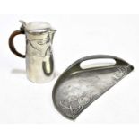 ARCHIBALD KNOX FOR ENGLISH PEWTER; a Liberty & Co pewter water jug with wicker handle, impressed