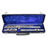 BUFFET; a cased silver plated flute.