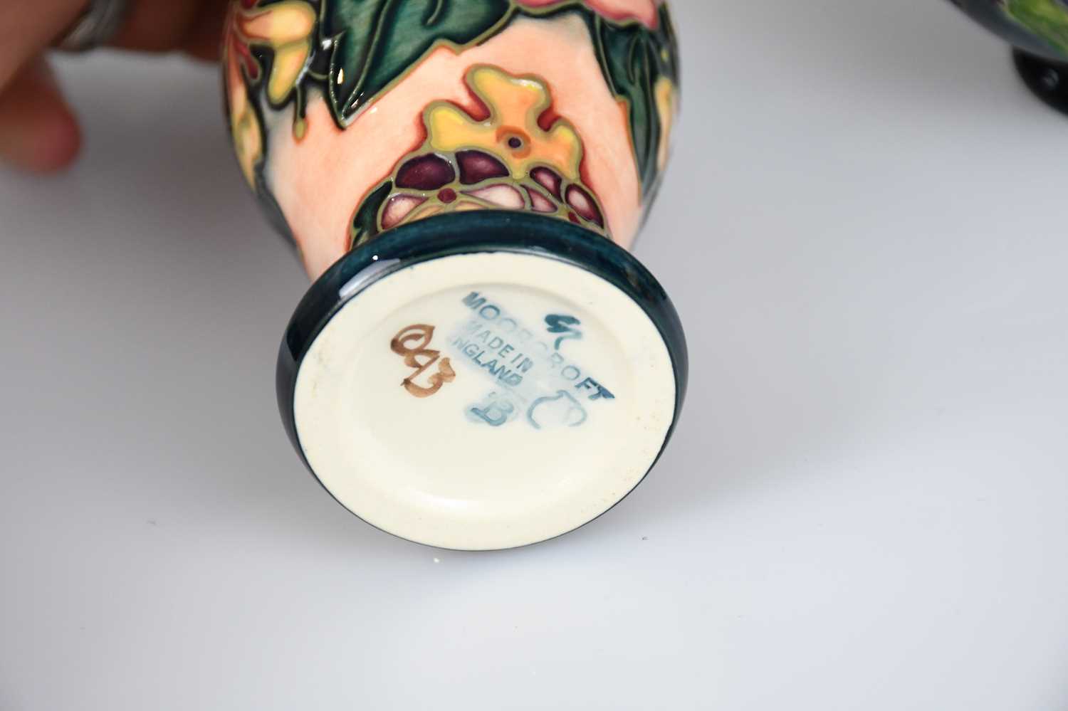 MOORCROFT; three small vases, including an example decorated in the 'Oberon' pattern, height 10cm. - Image 3 of 5