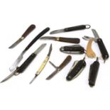 A mixed group of pen knives to include four WWII jack knives, a cut throat razor, etc.