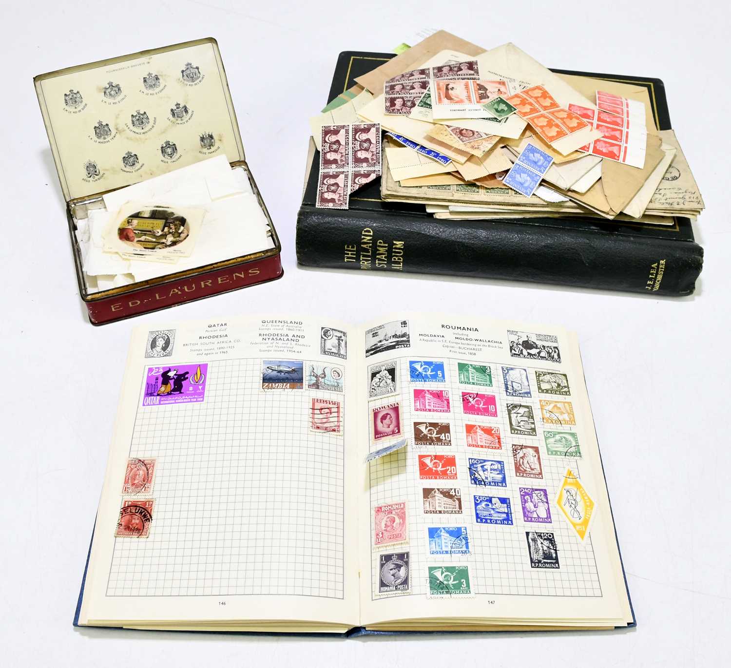 A collection of predominantly British stamps, contained in an album and loose, together with a tin