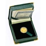 SOUTH AFRICAN MINT; a 24ct gold 1996 commemorative coin, decorated with an elephant, 3.110g,