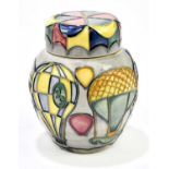 JEANNE MCDOUGALL FOR MOORCROFT; a small ginger jar and cover decorated in the 'Balloons' pattern,