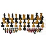 A full set of wooden chess pieces, in wooden box Condition Report: Height of king 8cm.