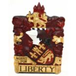 A cast metal 'Agent for Liberty' sign, decorated with heraldic shield and lion, 57 x 37cm.