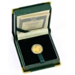 SOUTH AFRICAN MINT; a 24ct gold 1996 commemorative coin, decorated with an elephant, 3.110g,