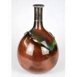 BRETBY; a large bottle vase with white metal collar, decorated with a Majolica type glaze to the