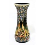 MOORCROFT; a tall vase decorated with a woodland scene, impressed and painted marks, height 30.5cm.