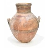 A 5th-6th century Skyphos (wine jar) with bands of painted detail to the terracotta ground and