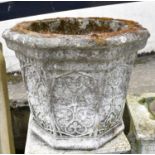 A reconstituted stone garden planter, with lace detailing, height 42cm.