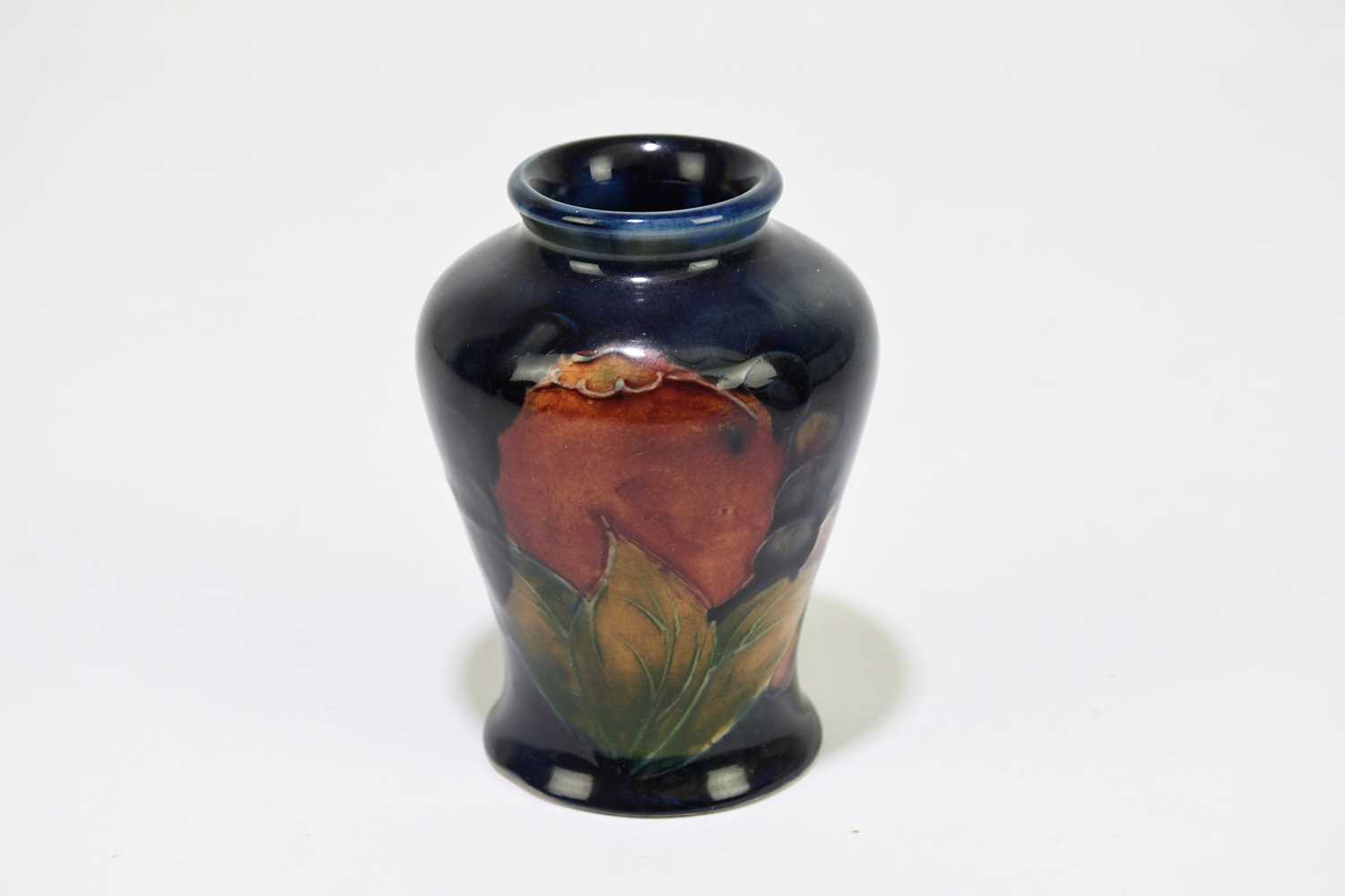 MOORCROFT; a small 'Pomegranate' pattern vase, impressed marks and impressed signature, height 8. - Image 2 of 4