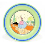 CLARICE CLIFF; a circular plate decorated in the 'Crinoline Lady' pattern, printed marks, diameter