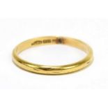 An 18ct yellow gold wedding band, size M 1/2, approx. 1.8g.