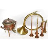 A quantity of copper and brassware to include a copper and brass tea urn, five copper horns,