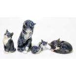 ROYAL COPENGHAGEN; four models of cats, height of largest example 18cm (4).Condition Report: Good