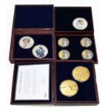 A collection of modern oversized commemorative medallions comprising Mint Editions Iconic London