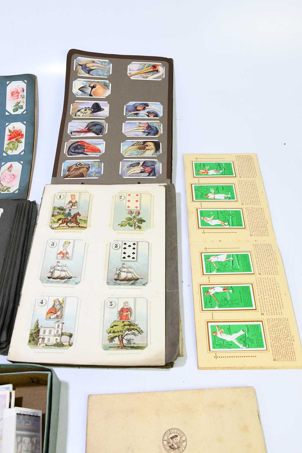 A collection of assorted cigarette and tea cards, various sets, to include military medals, insects, - Image 2 of 5