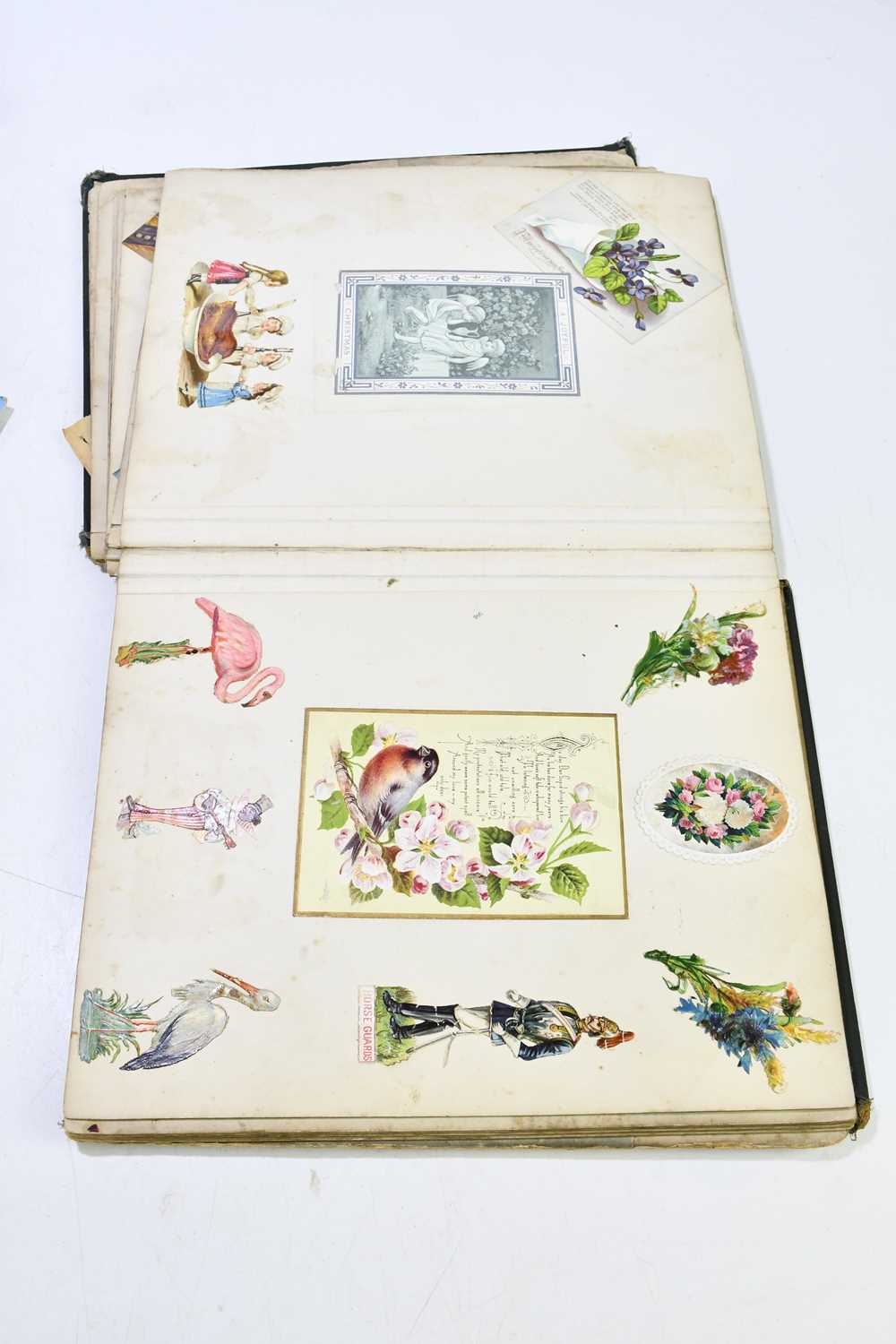 A late 19th/early 20th century scrapbook album containing various postcards and images, together - Image 6 of 6