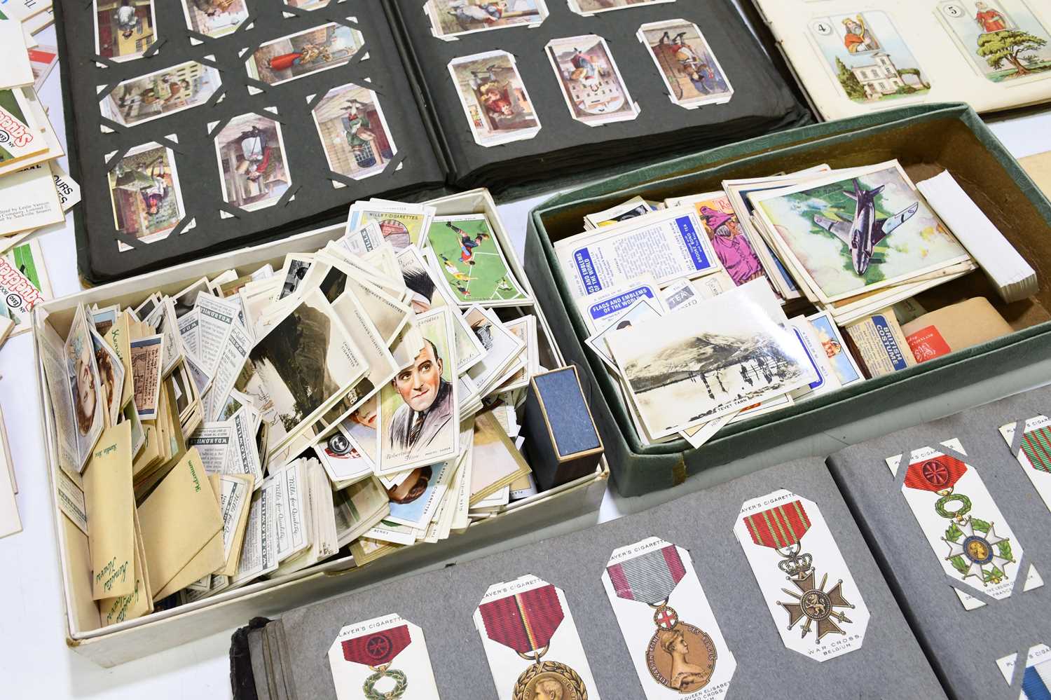 A collection of assorted cigarette and tea cards, various sets, to include military medals, insects, - Image 3 of 5