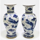 Two Chinese blue and white crackle glazed vases, with bronzed metal mounts, each decorated with five