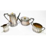 THOMAS BRADBURY & SONS; a Victorian hallmarked silver four piece tea service of oval form, with