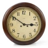 ENFIELD; a stained mahogany eight day wall clock, the dial with Arabic numerals, diameter 39cm.