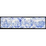 Four 19th century Dutch Delft tiles on decorative circular panels to include religious scenes,