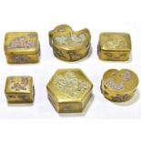 Six Chinese brass snuff boxes of different size and shape, relief decorated with fruit and flowers.