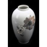 ROYAL COPENHAGEN; a cylindrical vase with floral decoration, height 26cm.
