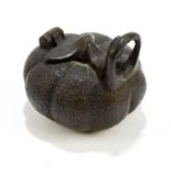 A Japanese bronze inkwell modelled as a melon, height 3.5cm.