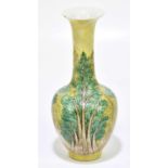 A Chinese vase, decorated with foliage against a yellow ground, six character mark to the