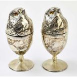A pair of contemporary novelty silver plated egg cups and covers, modelled as chicks, height 11.
