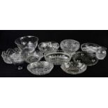 A large collection of decorative ceramics and cut glass, including cups and saucers, a cake stand,