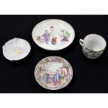 A 19th century Chinese porcelain saucer dish decorated with figures with landscape beyond,