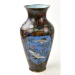 A Japanese cloisonne vase, decorated with three reserves with cranes, birds, and insects, with an