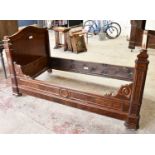 A 19th century French day bed, height 118cm, length 219cm, width 116cm.
