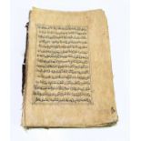 A 17th / 18th century Middle Eastern prayer book / Koran fragment, a bound selection hand written
