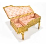 A late 19th century gilt metal jewellery casket modelled in the form of a harpsichord, with cast