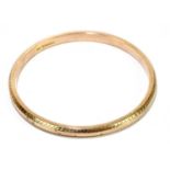 A 9ct rose gold fixed bangle, internal width approx. 75mm, approx. 13g.