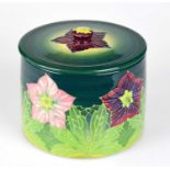 SALLY TUFFIN FOR DENNIS CHINAWORKS; a circular jar and cover, decorated with anemones, impressed