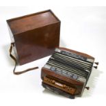 A Victoria patent metal action accordion, cased.