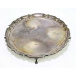 A George V hallmarked silver salver, with pie crust border, Birmingham 1929, diameter 26cm, weight