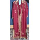 A Gentleman's burgundy full length gown, with gold coloured thread and sequins, length 145cm.