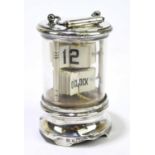 CHARLES GREEN & CO; an Edwardian hallmarked silver clockwork mantel timepiece of cylindrical form,